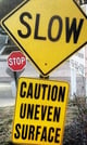 Caution-Uneven-Surface